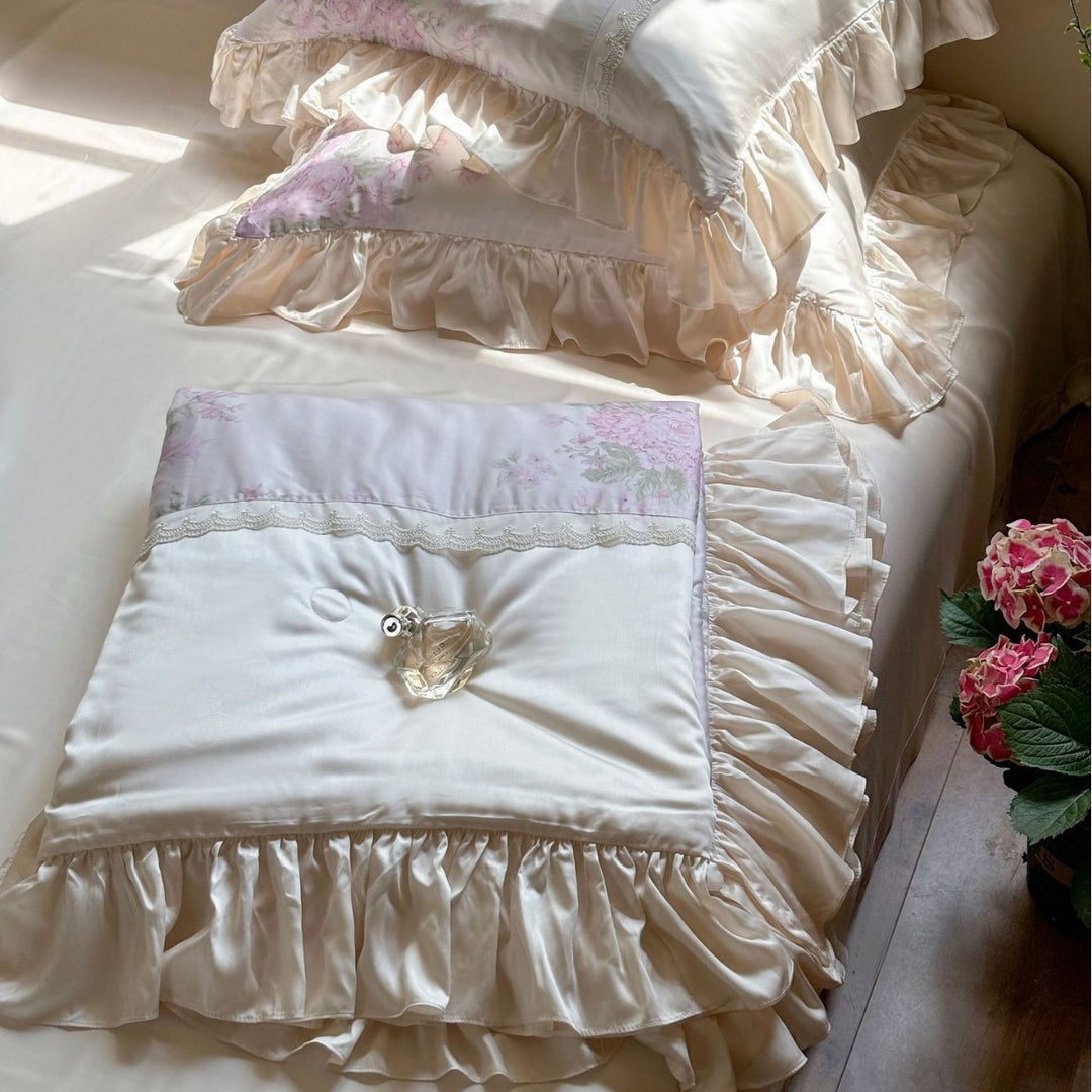 Ruffled satin pillowcase with flounce, lace border, and floral insert