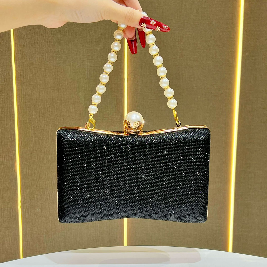 rhinestone-embellished evening clutch