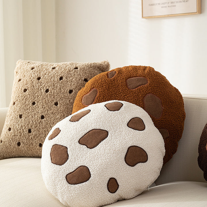 Round cuddle seat cushion with teddy fleece and abstract patch appliqués Stornfield