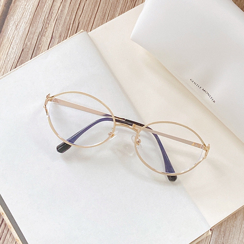 Round Sunglasses with Golden Accents Stornfield