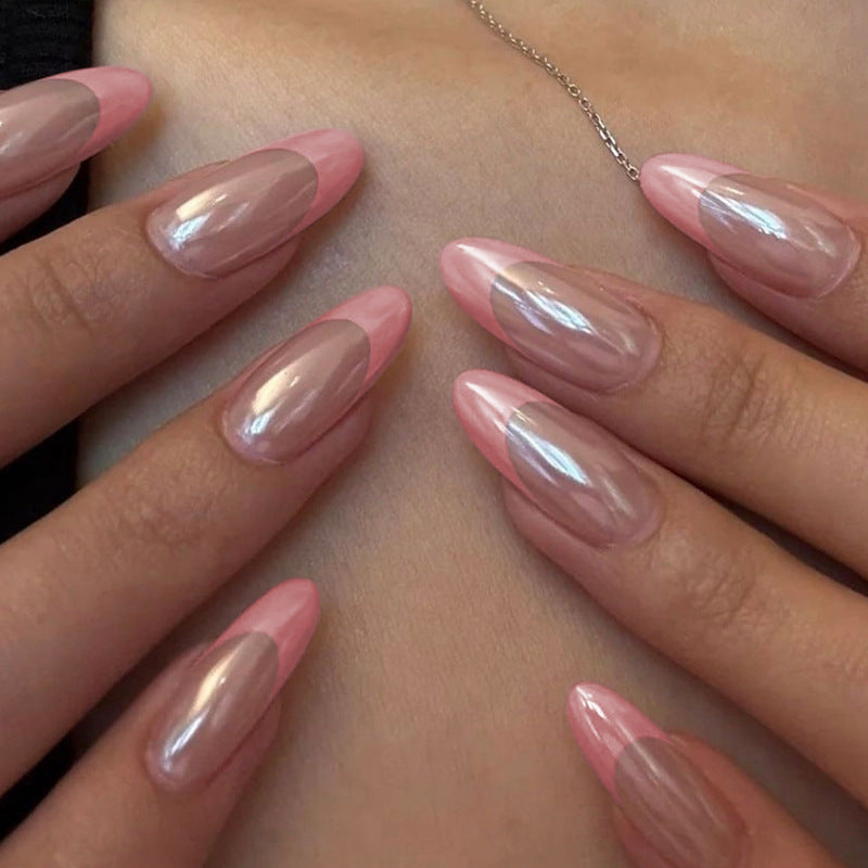 Acrylic nail set with elegant pointed shapes and glossy accents Stornfield