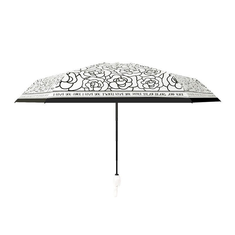 Ladies folding umbrella with playful flower design Stornfield