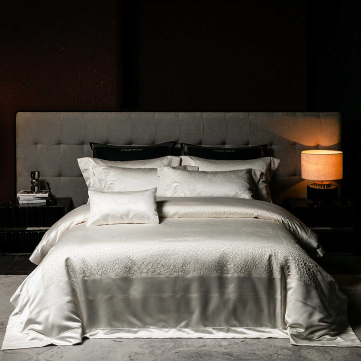 Jacquard bedding set made of cotton satin with embossed medallion and pillow ruffle