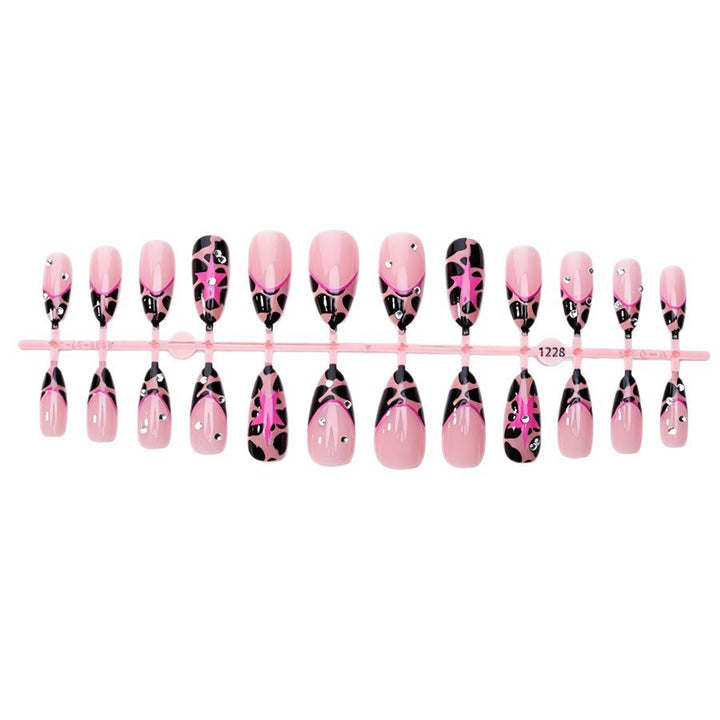 Nail set with glamorous leopard design and glitter elements Stornfield