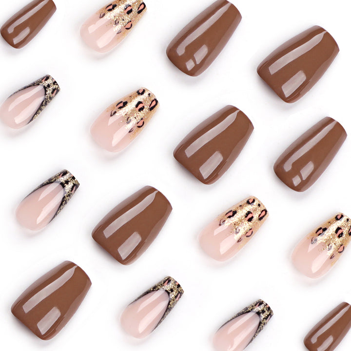Glamorous acrylic nails with glitter and leopard designs Stornfield