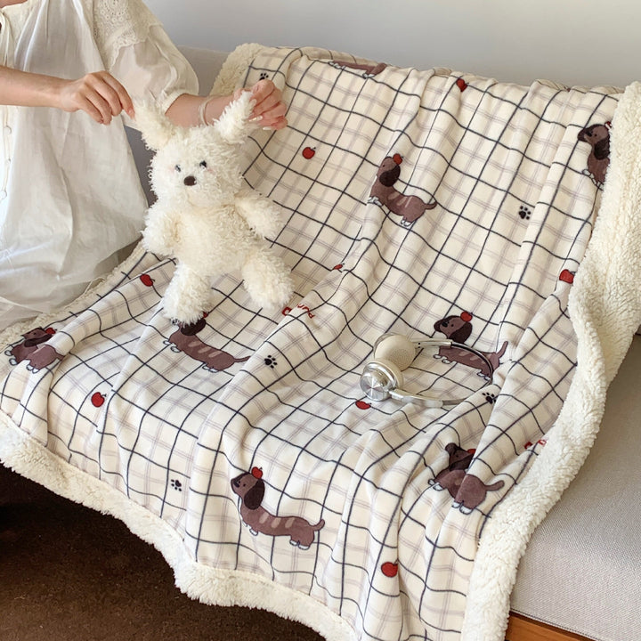 Reversible fleece blanket with cartoon cat design and teddy lining