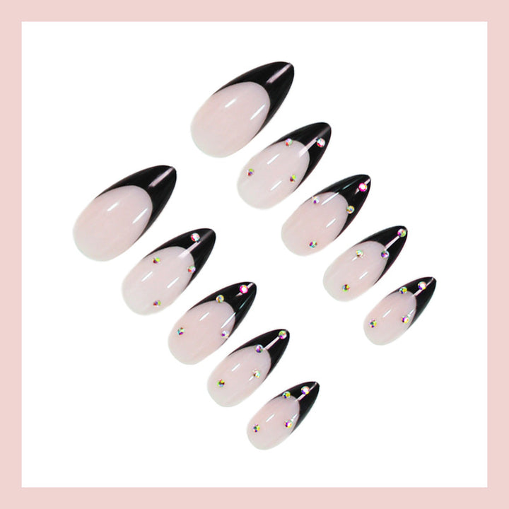 Artificial nail set with elegant tips and glamorous decorations Stornfield