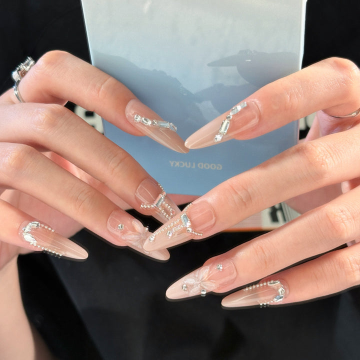 Elegant artificial nails with noble rhinestone embellishments Stornfield