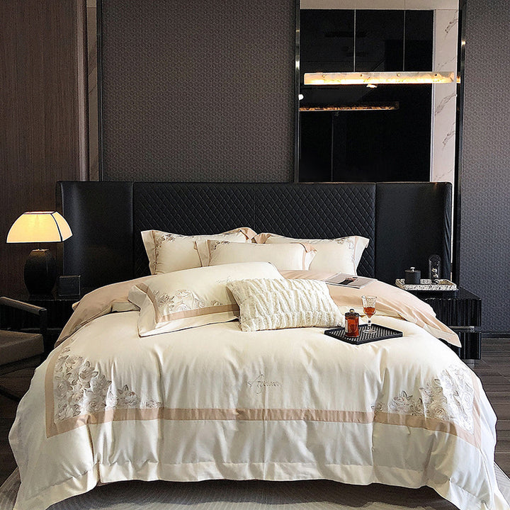 Hotel-style bedding set made of cotton satin with embroidered rose relief and fine border