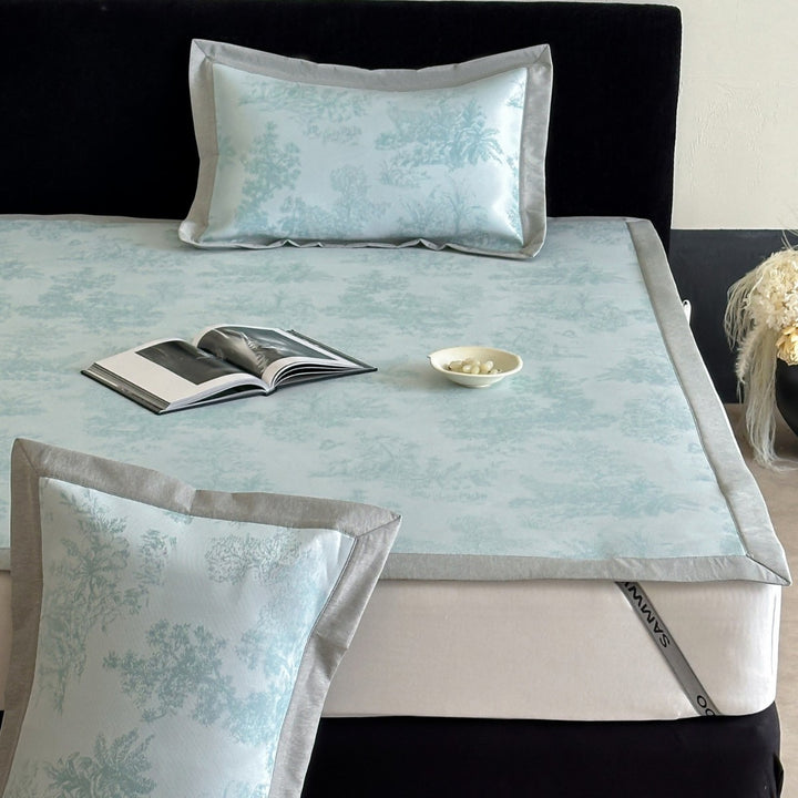 high-quality non-slip mattress protector with integrated fitted sheet and elegant jacquard pattern