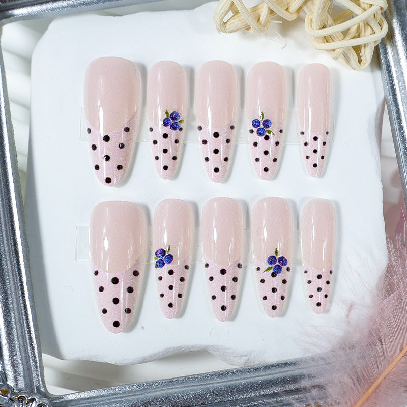 Acrylic nail set with stylish dots and floral embellishments Stornfield