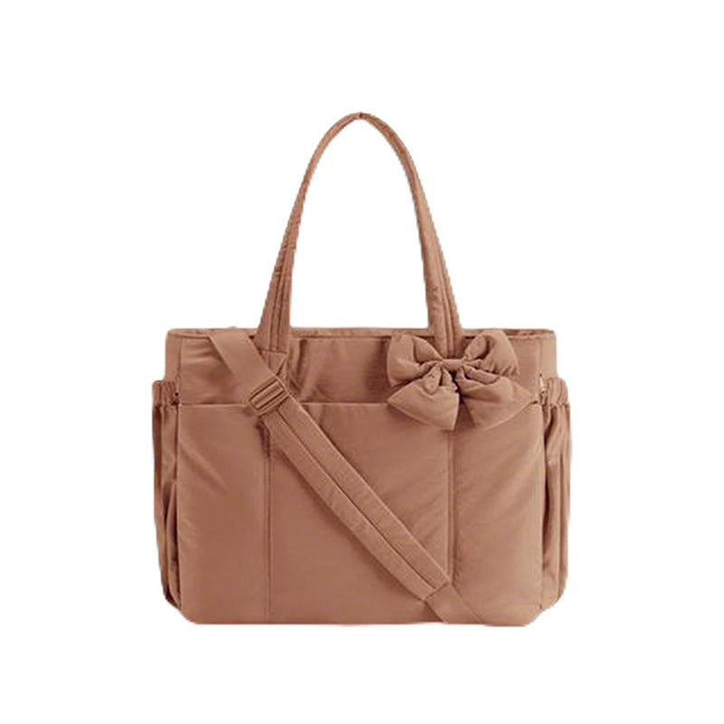 Practical tote bag with retractable shoulder strap and fashionable bow Stornfield