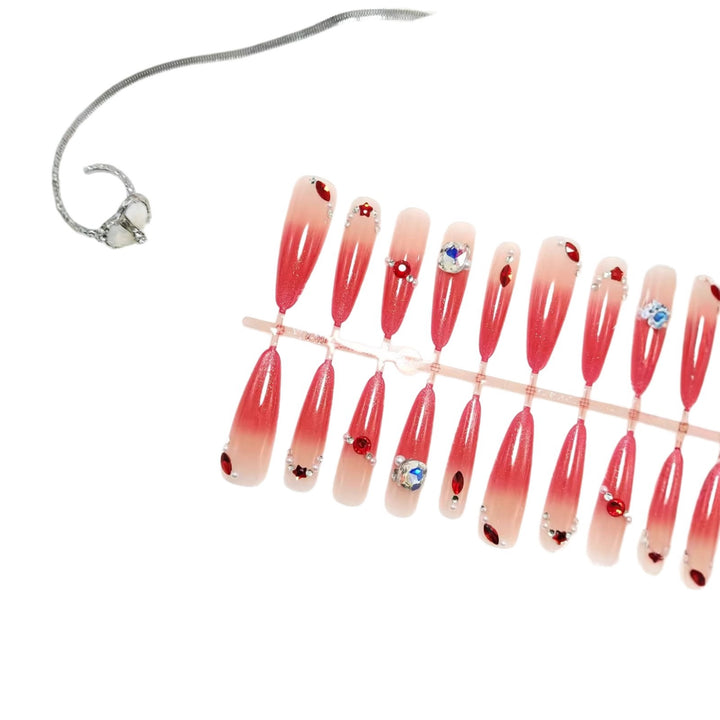 Glamorous artificial nails with sparkling ombre effect and elegant embellishments Stornfield