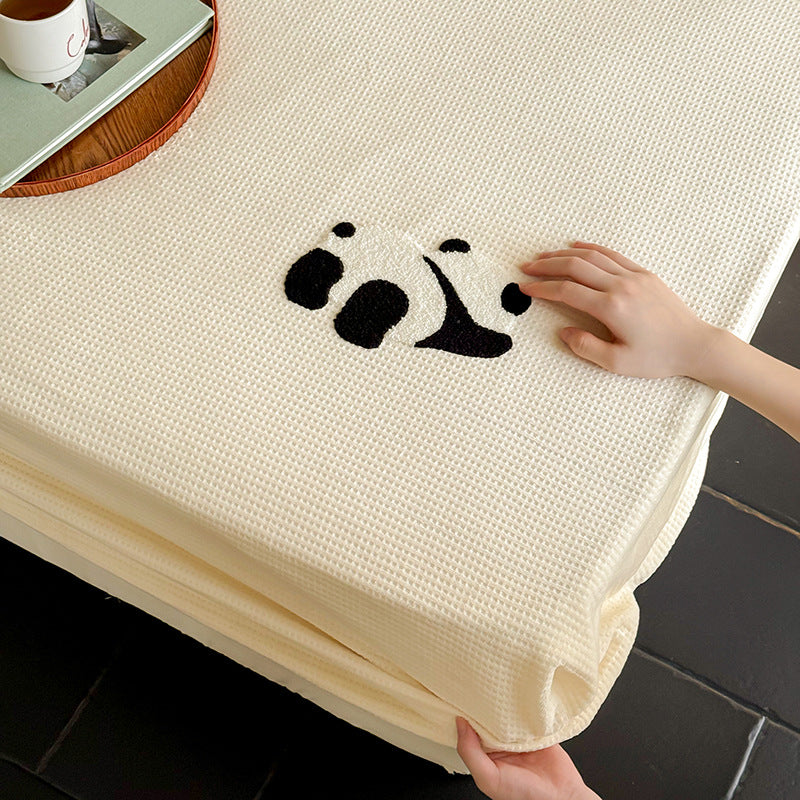 Elastic fitted sheet set made of waffle pique with embroidered panda applique