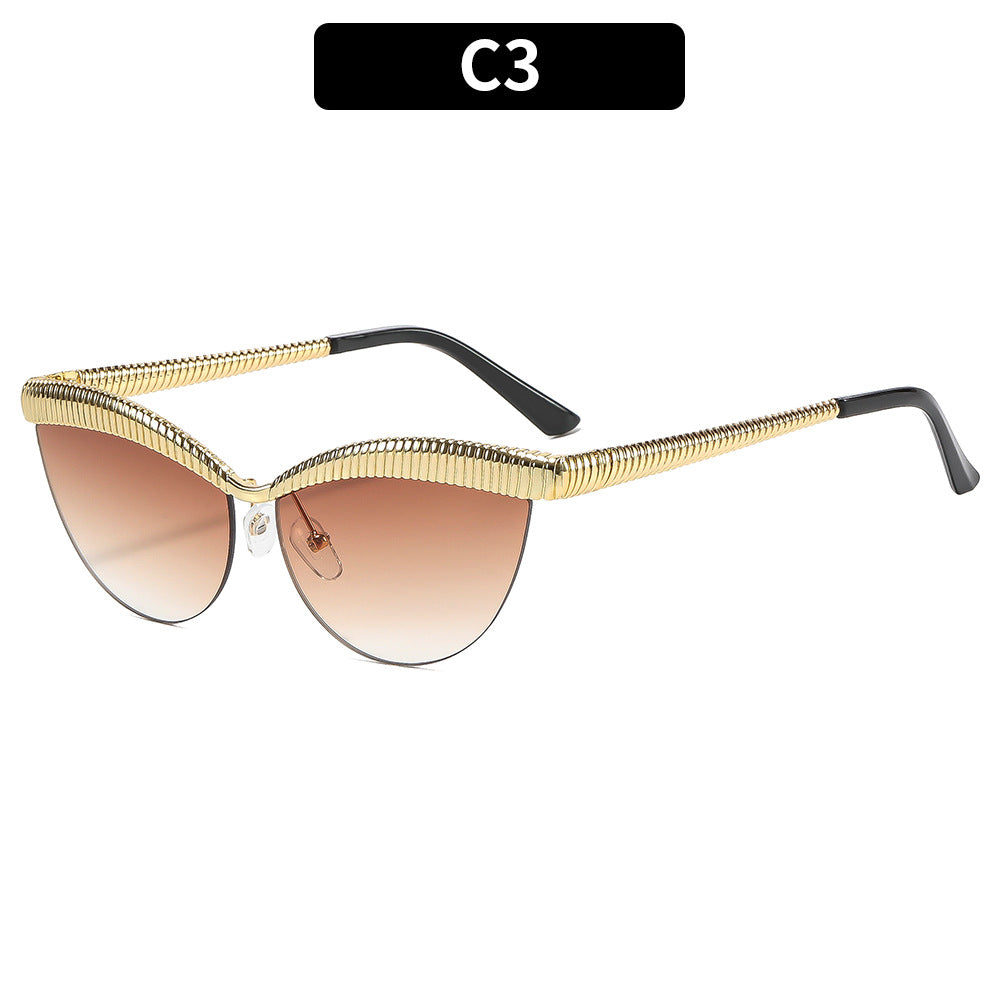 Elegant Cat-Eye Sunglasses with Metallic Accents