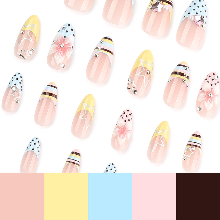 Creative nail designs with floral accents and glitter Stornfield