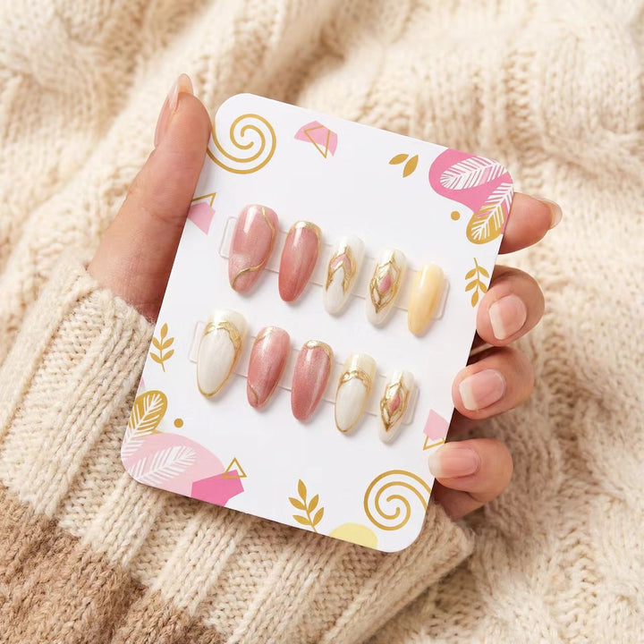 Artificial nails with floral gold accents and glossy finish Stornfield