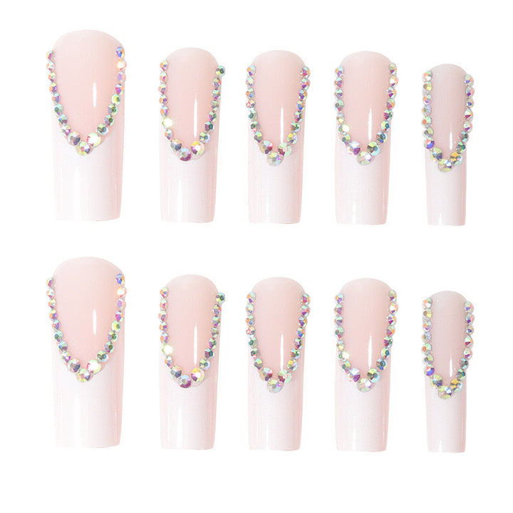 Artificial nail set with glamorous rhinestones and elegant tip decorations Stornfield