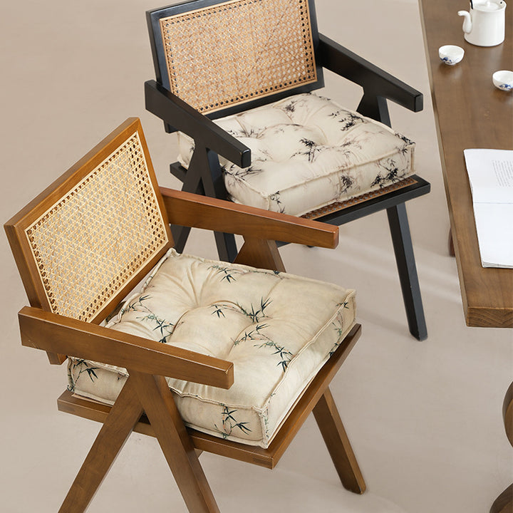 Padded seat cushion with tufting and bamboo motif