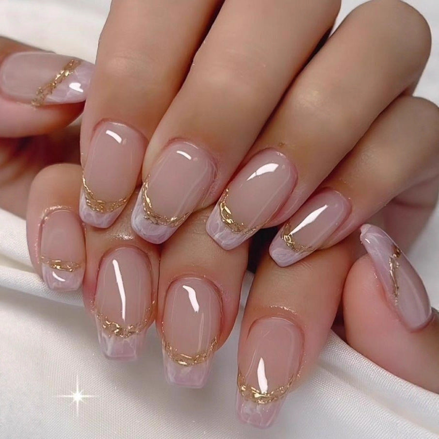 Elegant artificial nails with gold accents Stornfield