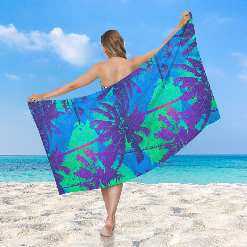 Women's beach towel with vibrant palm motif Stornfield