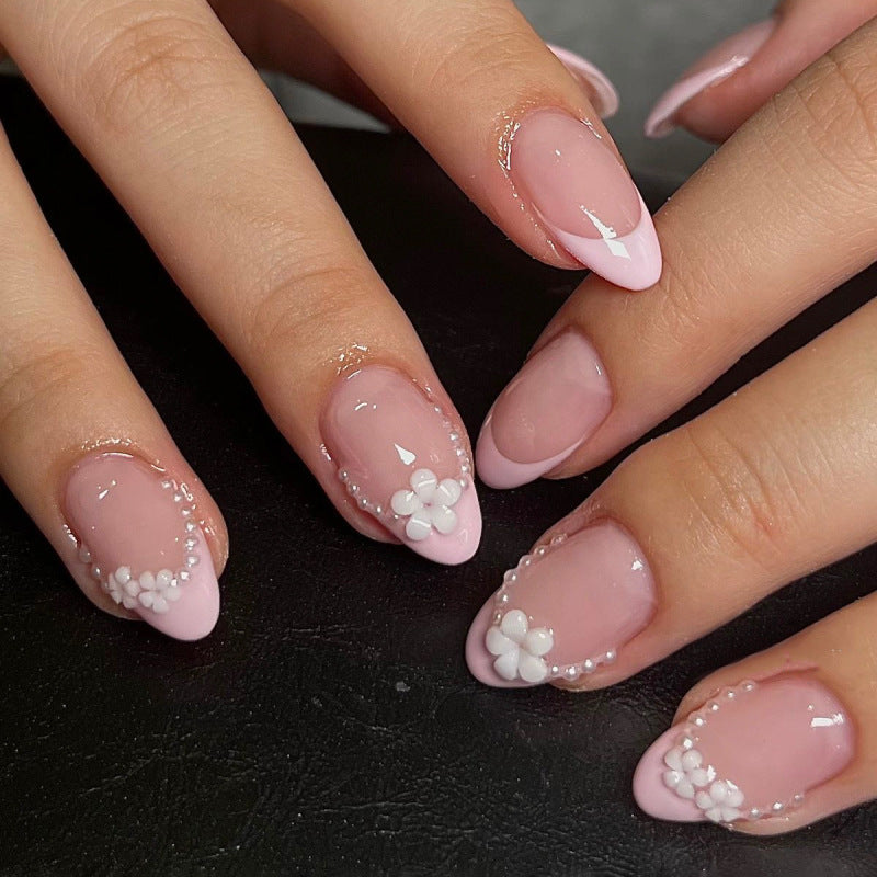 Artful acrylic nails with elegant floral accents Stornfield