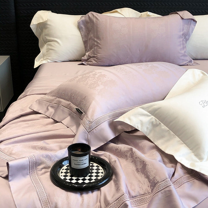 Premium bedding set made of cotton satin with subtle circle stitching and hotel closure