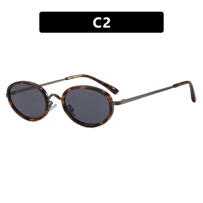Ladies elegant round sunglasses with stylish metal frame Stornfield