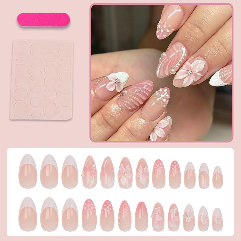 Acrylic nail set with elegant 3D flowers and embellished details Stornfield