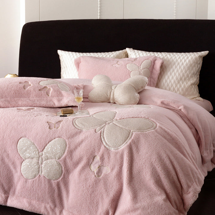 Cozy bedding and throw blanket set with applied butterfly appliqués and velvety microfleece look