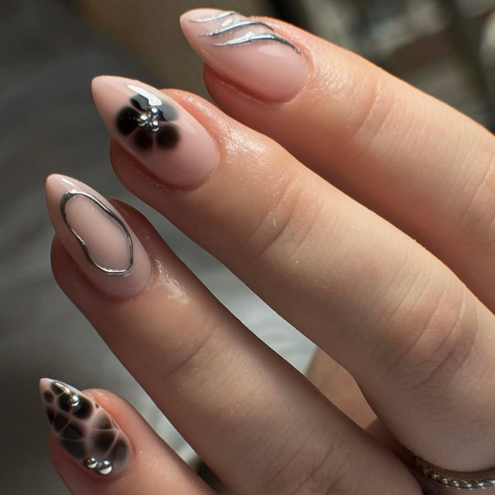Creative Nail Art with Glitter Accents Stornfield