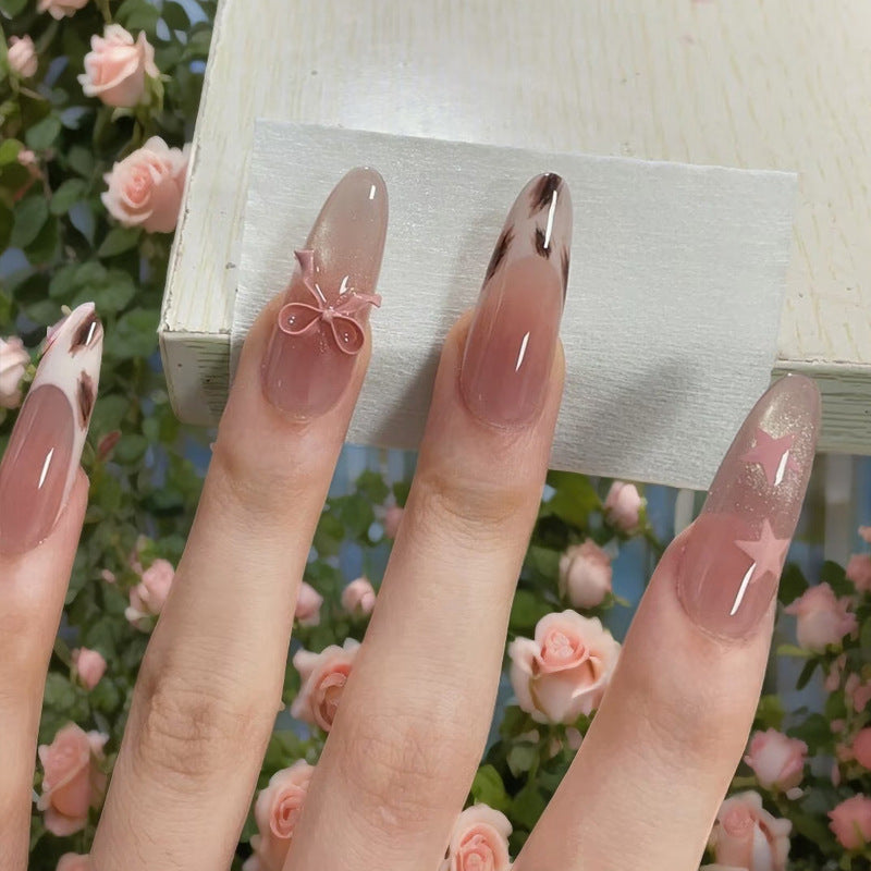 Artistic Press-On Nails with Bow and Star Accents Stornfield