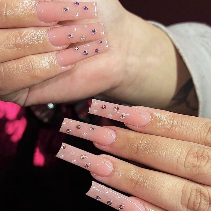 Acrylic nail set with sparkling rhinestone embellishments Stornfield
