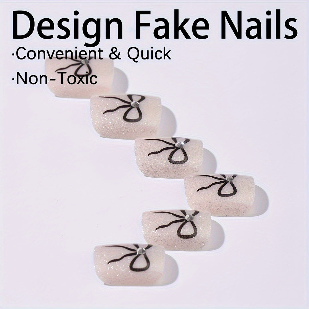 Acrylic nail set with sparkling accents and elegant bows Stornfield