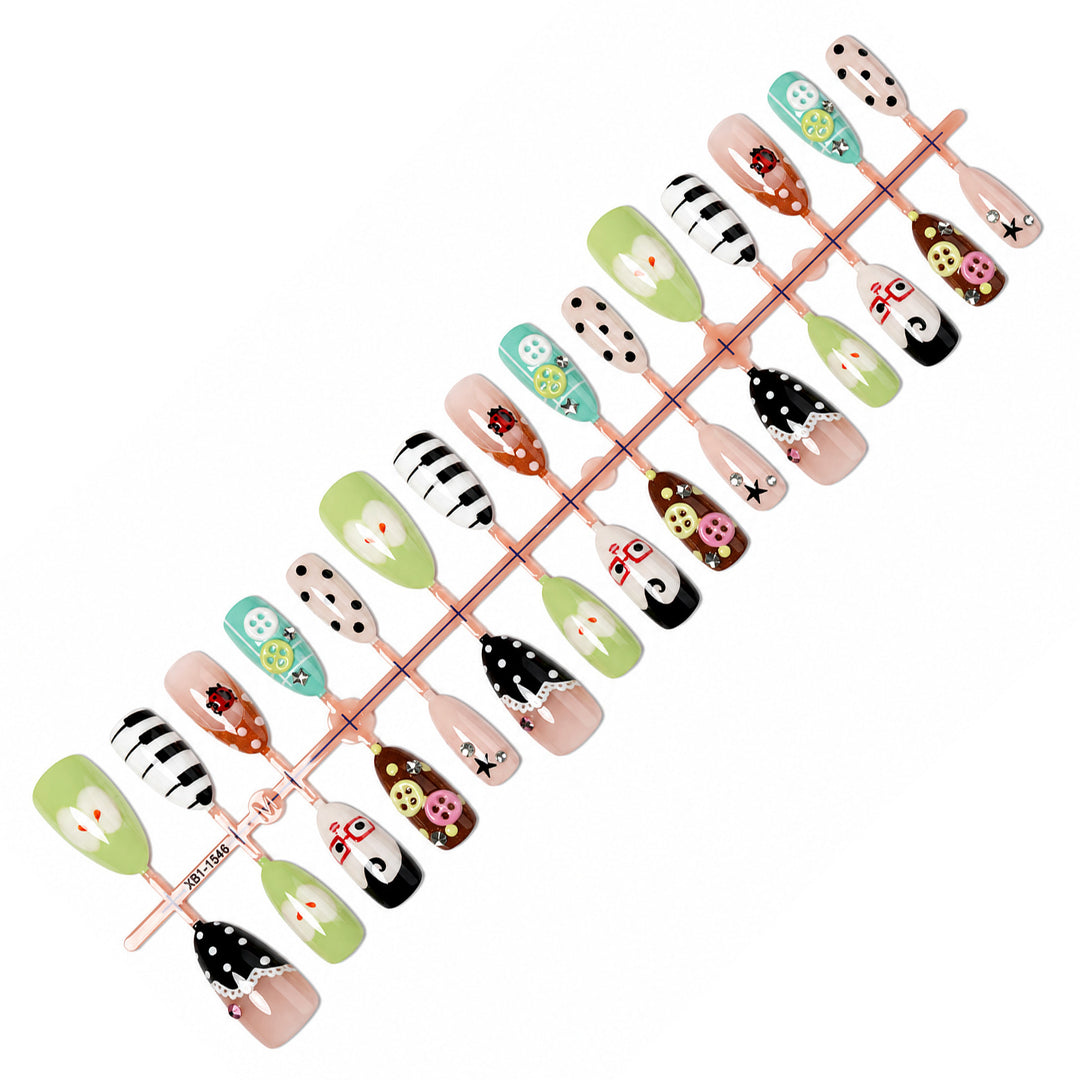 Creative nail art set with playful patterns and 3D details Stornfield