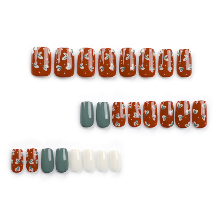 Elegant artificial nails with creative heart decorations Stornfield
