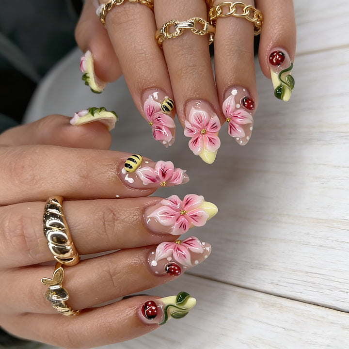 Artificial nail set with floral 3D applications and gloss finish Stornfield