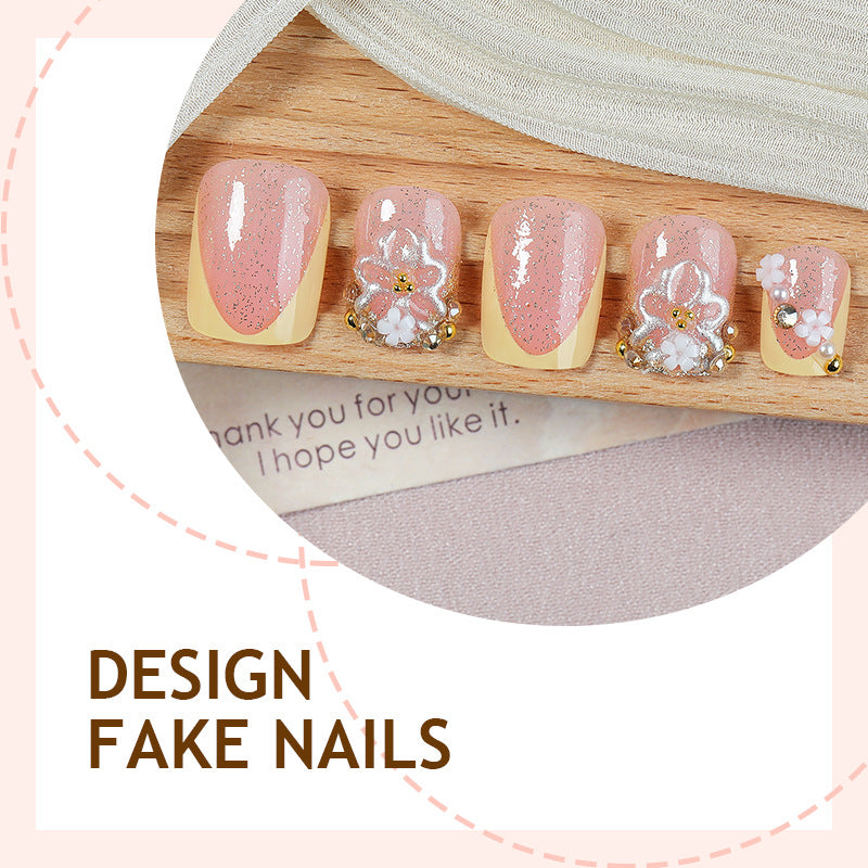 Nail art set with glamorous glitter and flower accents Stornfield