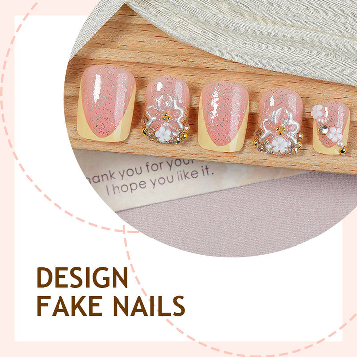 Nail art set with glamorous glitter and flower accents Stornfield