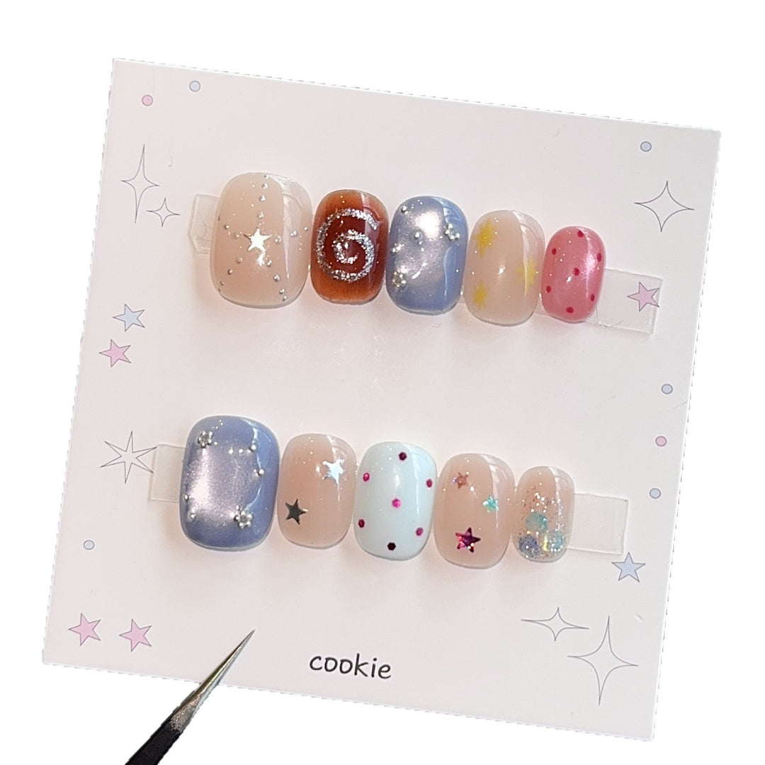 Creative artificial nails with sparkling star patterns Stornfield