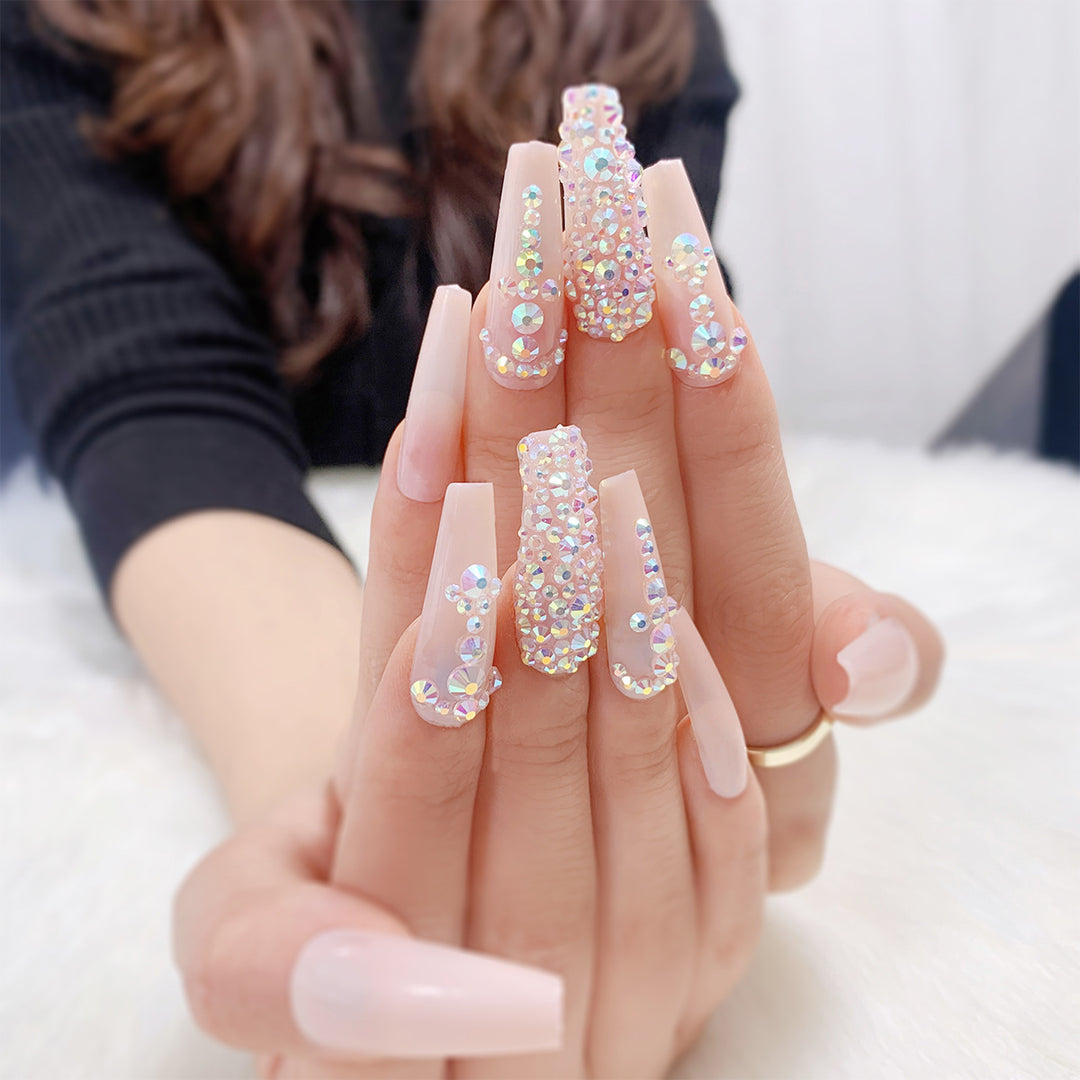 Glamorous nail extensions with rhinestone accents Stornfield
