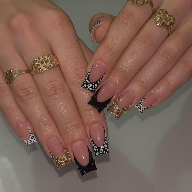 Artificial nails with luxurious 3D decorations and glamorous accents Stornfield