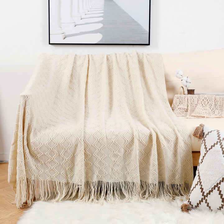 Ladies elegant and cozy knitted blanket with fringes Stornfield