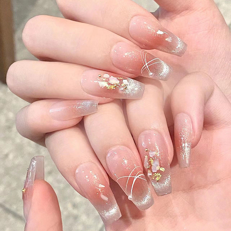 Artistic Press-On Nail Set with Glittery Star Accents Stornfield