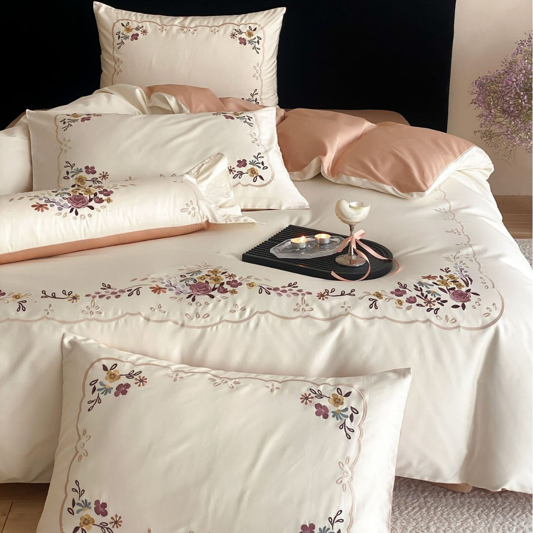 Embroidered cotton satin bedding set with floral border embroidery and reversible function