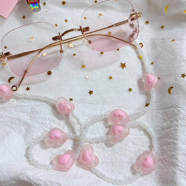 Fashionable glasses strap with heart pendants Stornfield