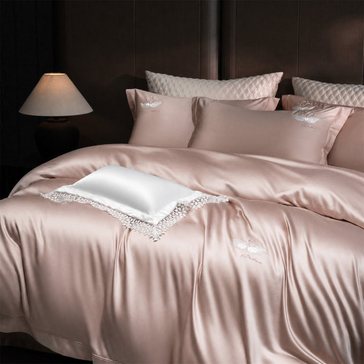 Luxurious satin bedding set with embroidered swan motif and lace pillow