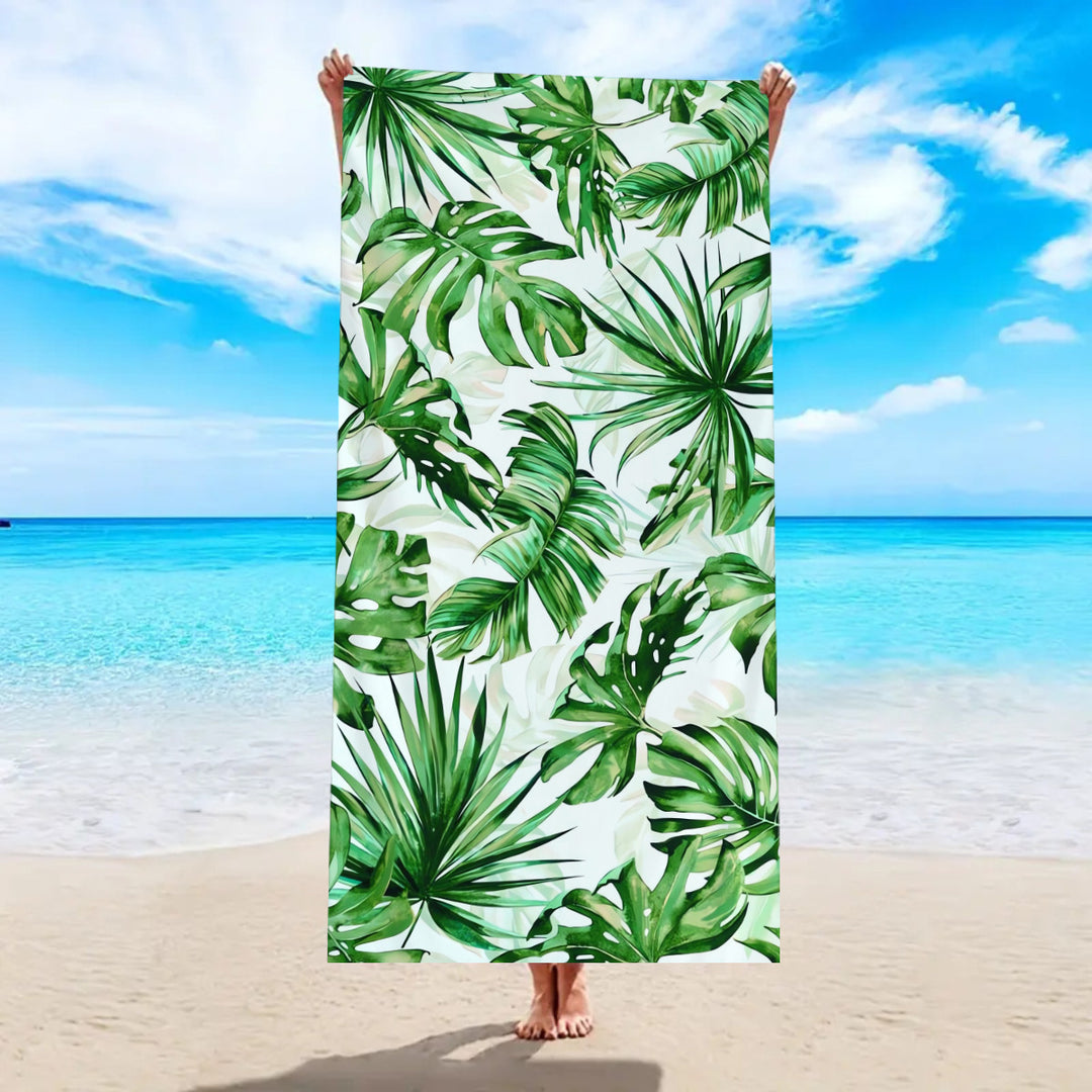 Beach towel with tropical palm leaf pattern Stornfield
