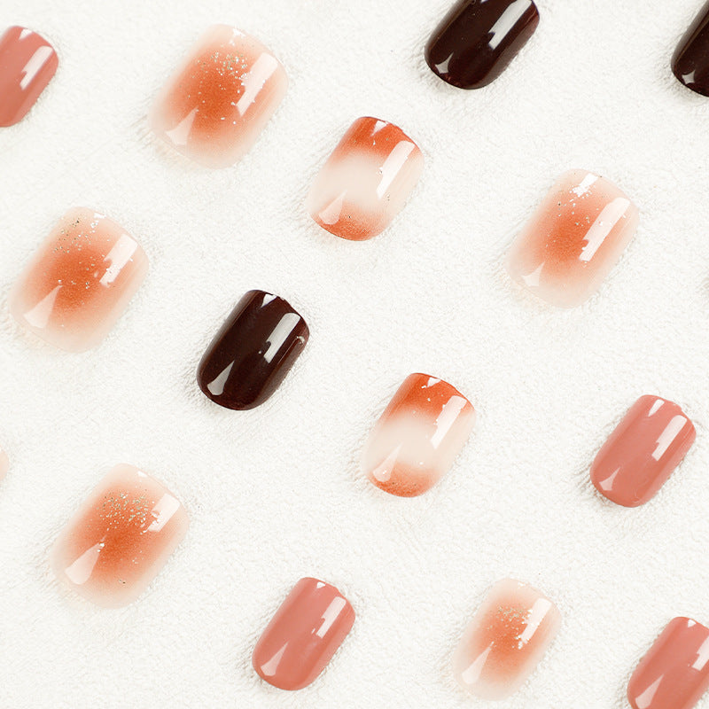 Elegant Nail Art with Glitter and Ombre Effect Stornfield