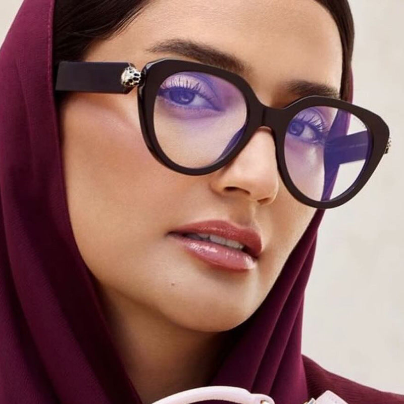 Ladies Cat-Eye Sunglasses with Golden Accents and Protective UV Filter Stornfield